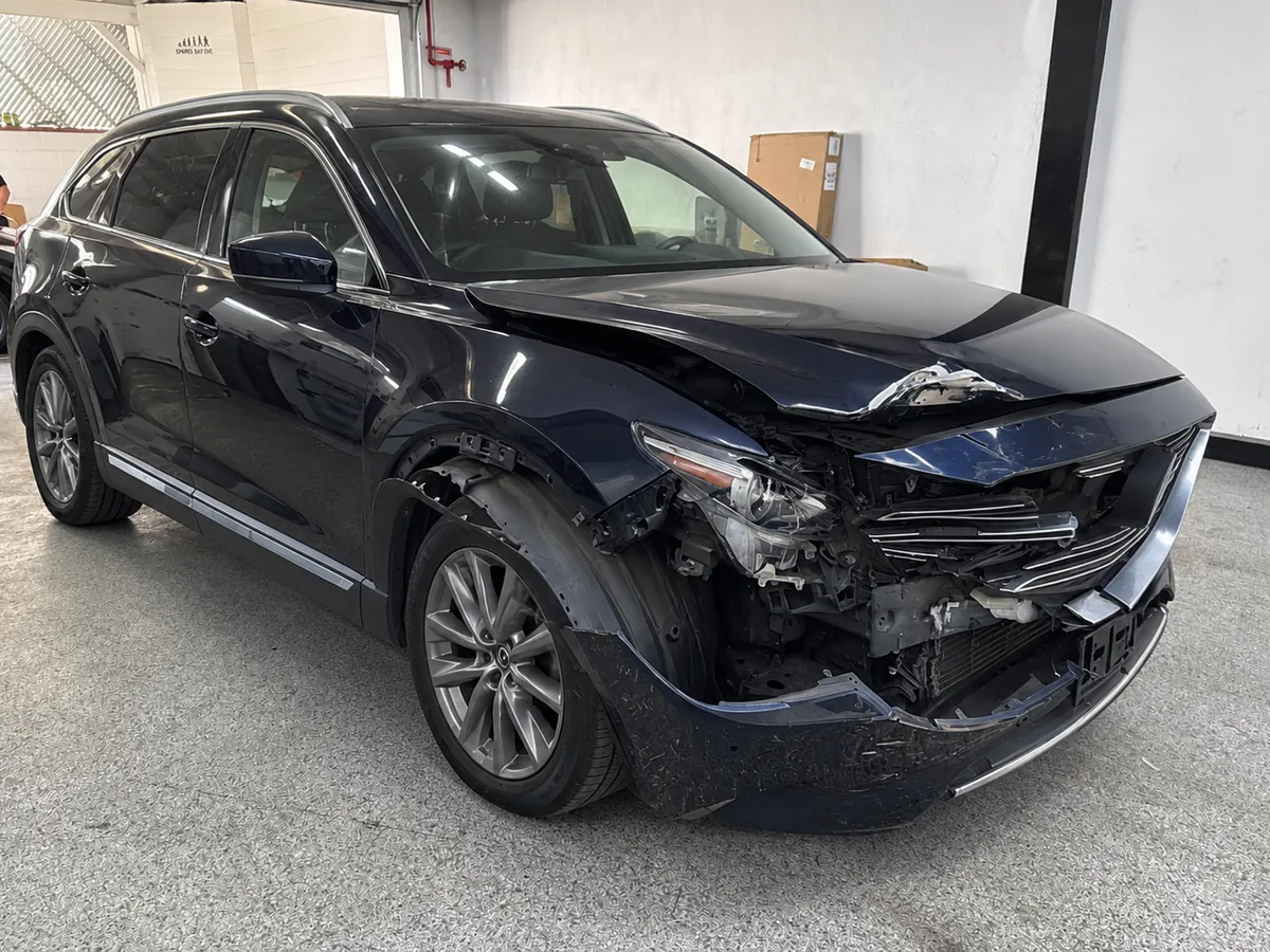 Before: Mazda Collision Repair example before repair