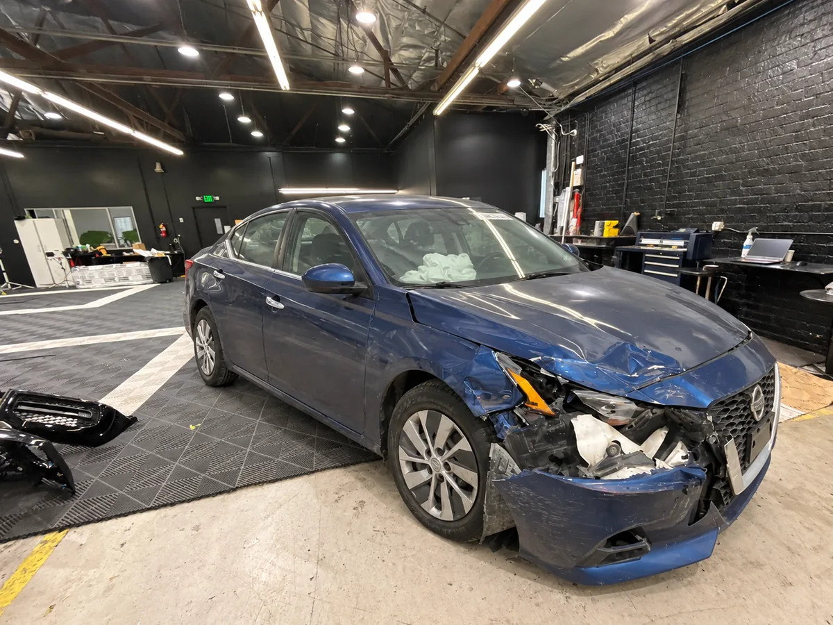 Before: Nissan Electric Vehicle Collision Repair example before repair
